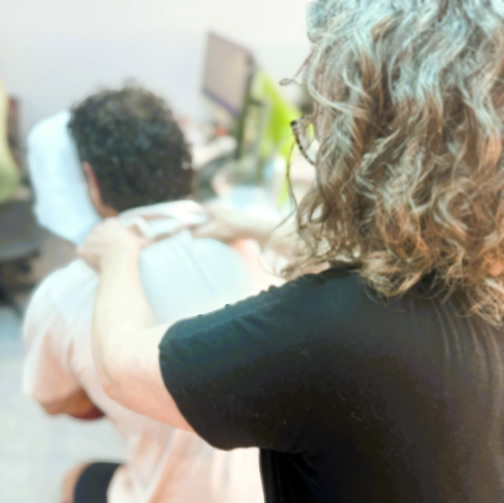 Client relaxing during a workplace massage